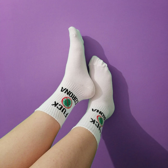 person wearing white and gray socks