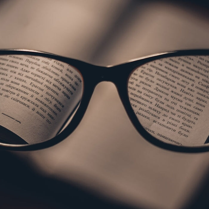 black text reflect on eyeglasses