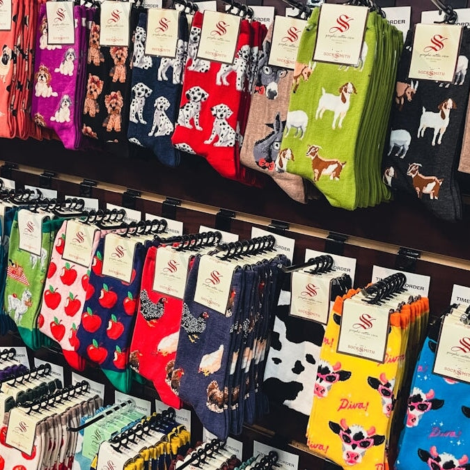 a display of colorful socks for sale in a store