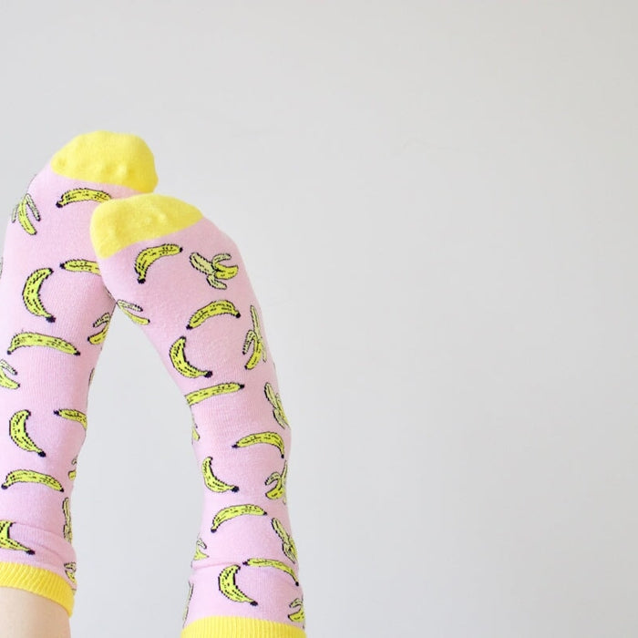 pair of pink-and-yellow socks