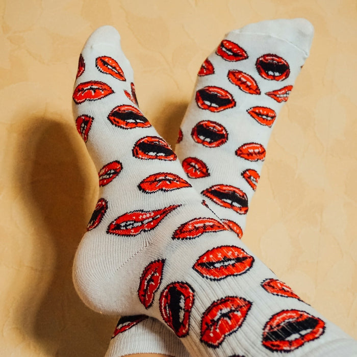 person wearing white and red socks